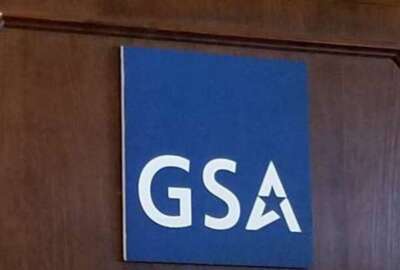 General Services Administration (GSA) logo on podium