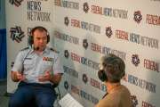 Cdr. Jonathan White, chief of the U.S. Coast Guard's decision advantage office, talks with Terry Gerton at the NDIA Emerging Technologies Conference 2026 in Washington.